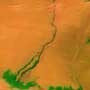 Mysterious River Advances through Desert